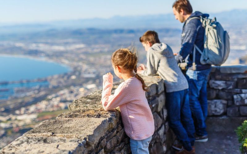 Children enjoying panoramic views over Cape Town on a family holiday, showing why South Africa good for families seeking adventure and variety.