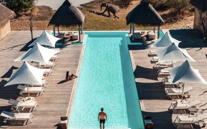 Swimming pool and sun deck at Kapama River Lodge overlooking the bush in the Greater Kruger
